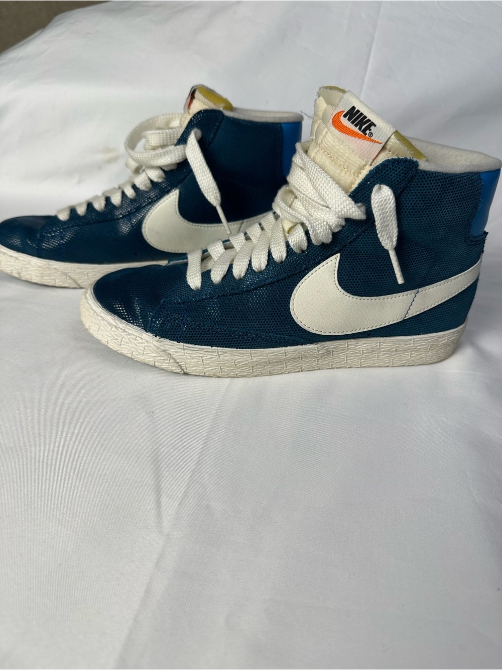 Nike Blue High-Top Sneakers with White Swoosh